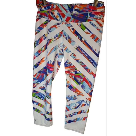 Athleta Pants - Athleta Velocity Laser‎ Cut Back Key Zipper Pocket Yoga Pants Leggings Sz M